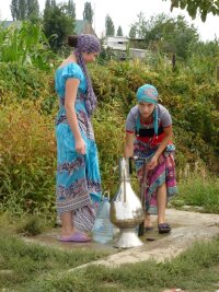 Dargi project: Two girls at the well in Druzhba