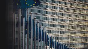 Flags of the member states of the European Union in front of the EU-commission building "Berlaymont" in Brussels, Belgium